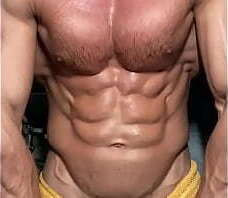 Big muscular body flexes and sprays lotion on his ripped big chest!