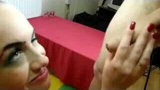 Blonde cougar in leather and boots takes two cocks