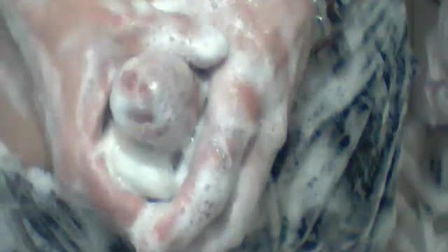 Soaping dick detailed view