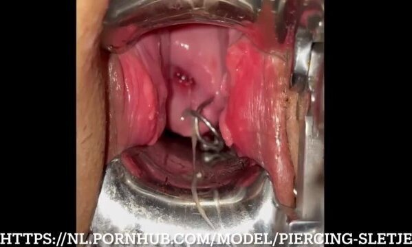 Sounding her uterus with nice view on her second uterus piercing!