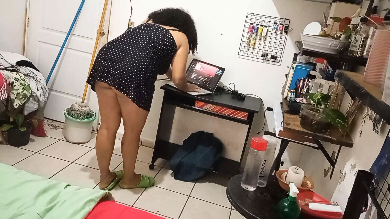 wife cleaning room dress thong