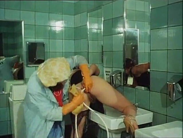 Classic Enema in Club's Bathroom