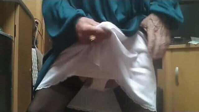 Transvestite granny in front zip girdle
