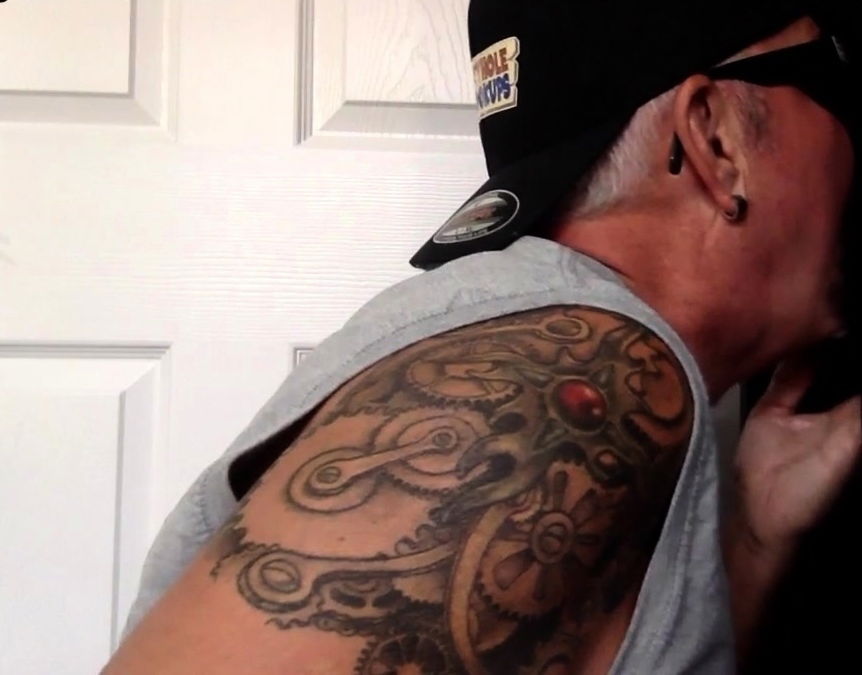 Mature DILF giving gloryhole blowjob