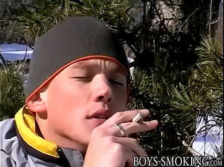 Athletic amateur smokes cigars jerks dick outdoor