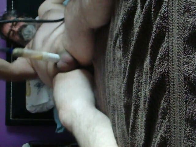 Wanking with a Venus 2000 and a dildo.