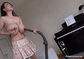 Busty asian girl vacuuming