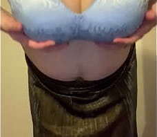 Man in Shiny Woman&rsquo_s Top and Long Skirt Takes off His Woman&rsquo_s Clothes to Show His Fake Boobs with His Bra and Panties, Jerks off to Futanari and Cums Inside His Own Panties