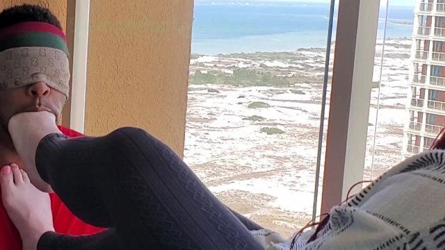 Foot gagging my sub on a resort balcony