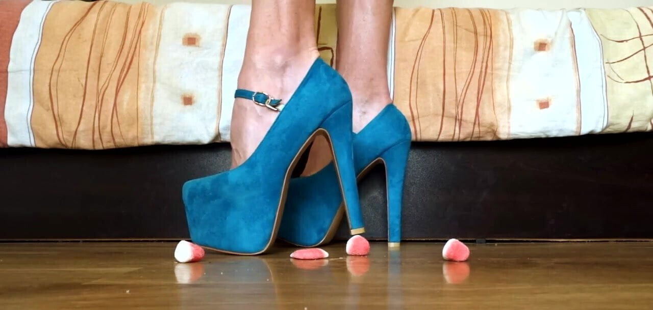 Crushing jelly bonbons with high heels