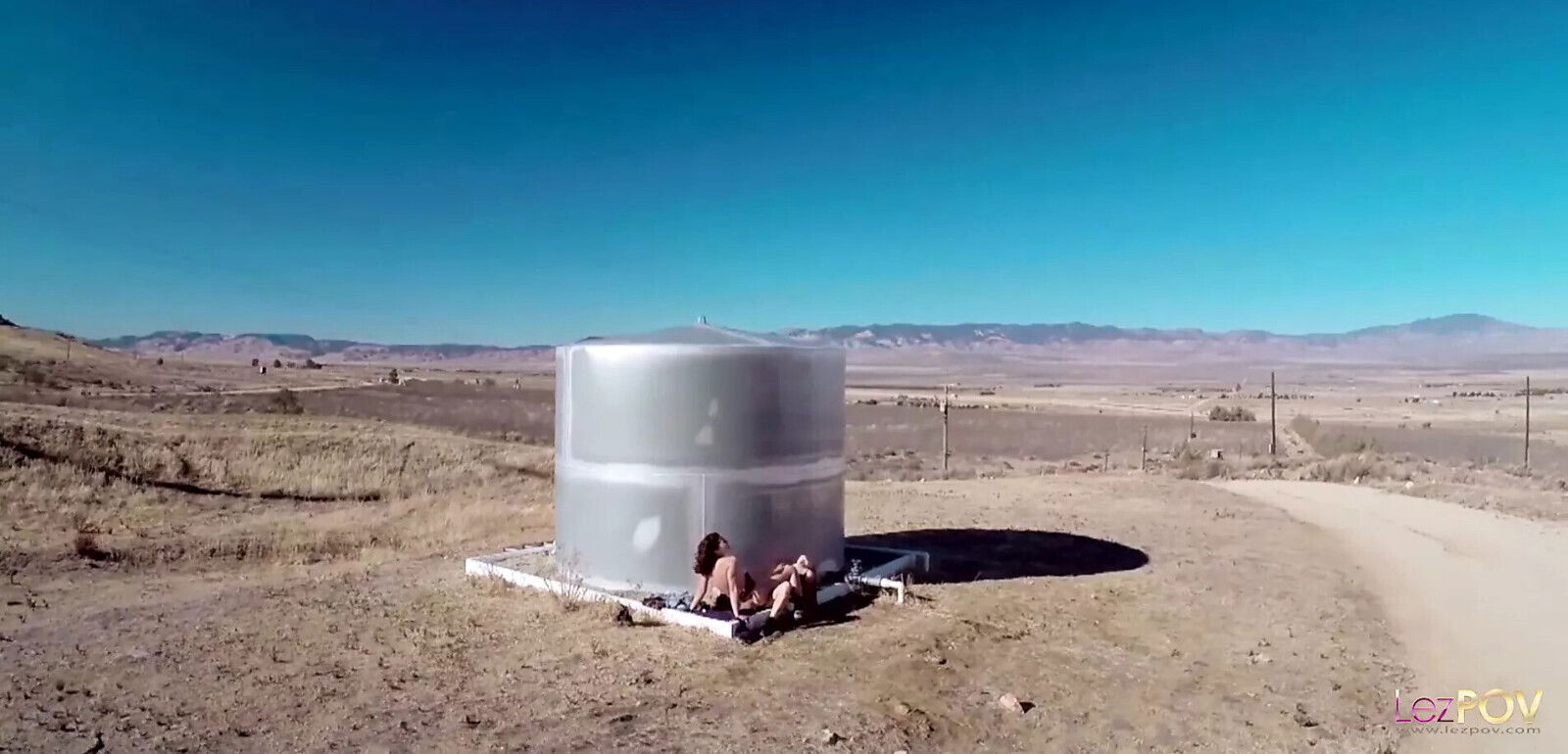 titted dykes having wonderful lesbian action including scissoring outdoors under clear blue