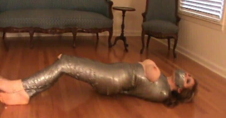 Another girl mummified with boobs barefeet exposed