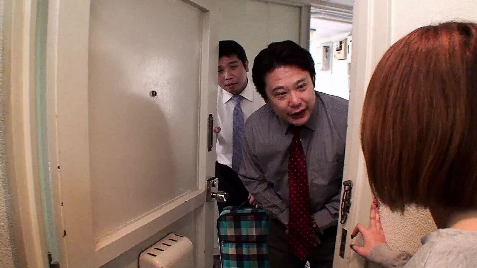 Japanese Milf gets goods salesman door tries toys they have sell