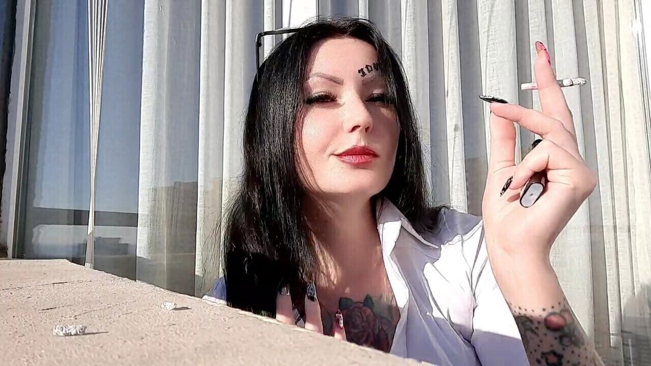 Smoking fetish. Dominatrix Nika smokes cigarettes sexually, blows smoke your face flicks cigarette ashes.