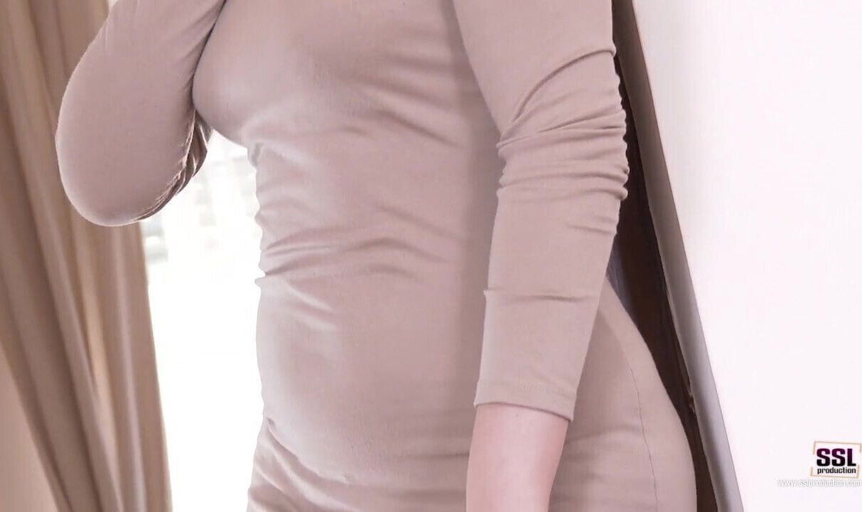 Russian read-head exploring her beauty in tan stockings