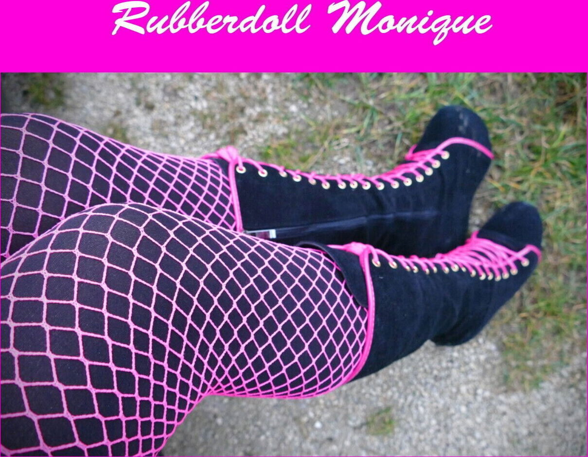 Rubberdoll Monique Wearing bimbo doll boots outside