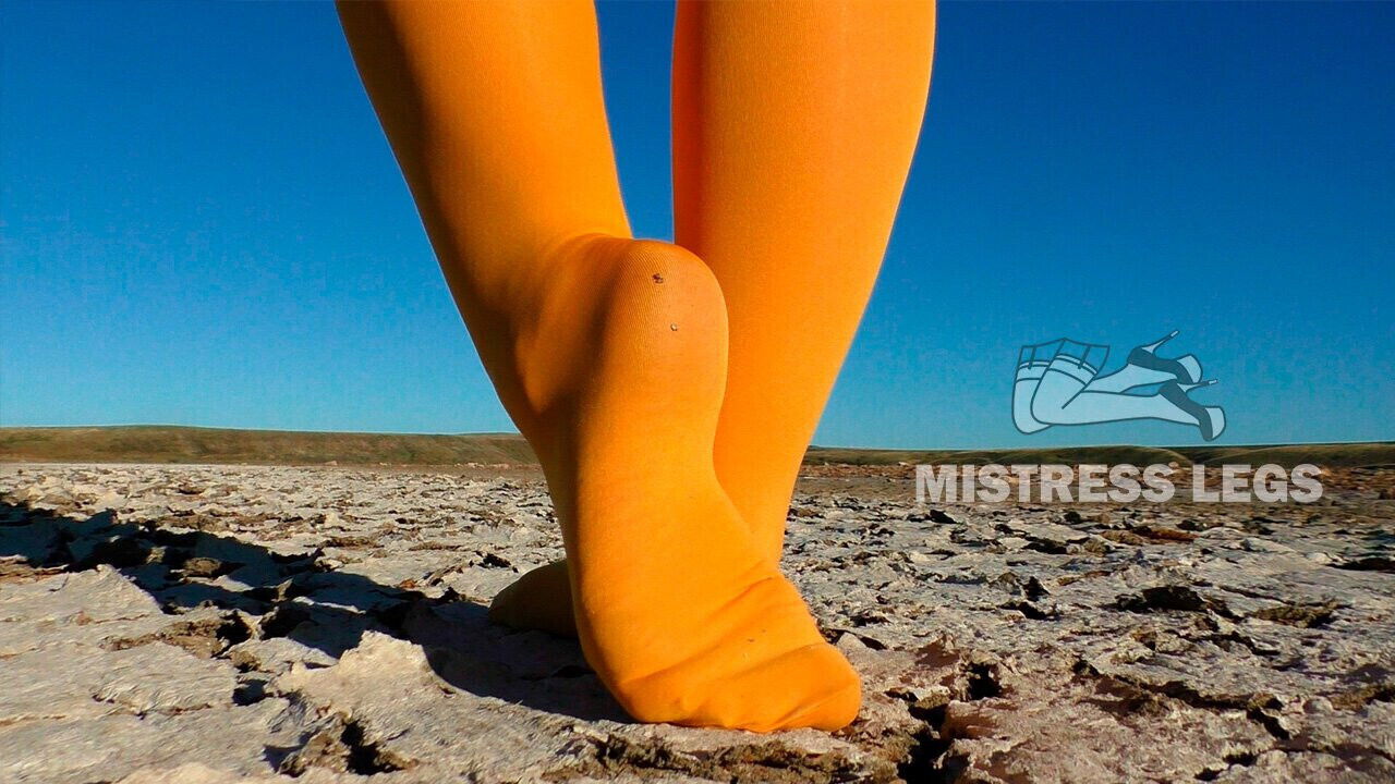 Barefoot walking dried lake yellow pantyhose