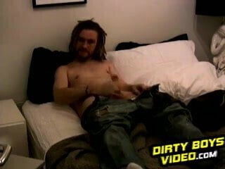 Amateur dude Rik rubs his dick in bedroom on the bed