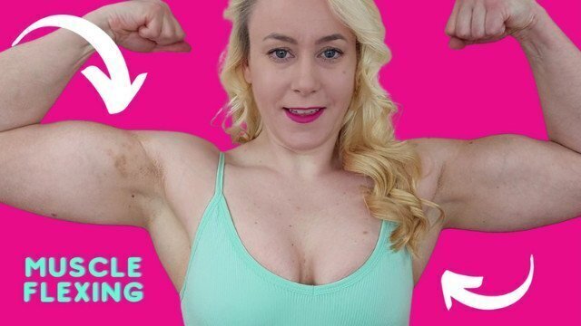 blonde bicep flexing muscualar milf female bodybuilder