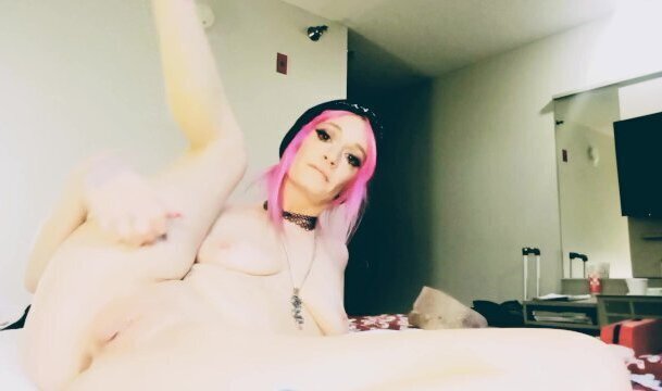 Tiny girl spreads pussy