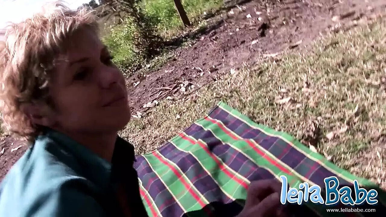 Leila Outdoor Nude with breast teasing