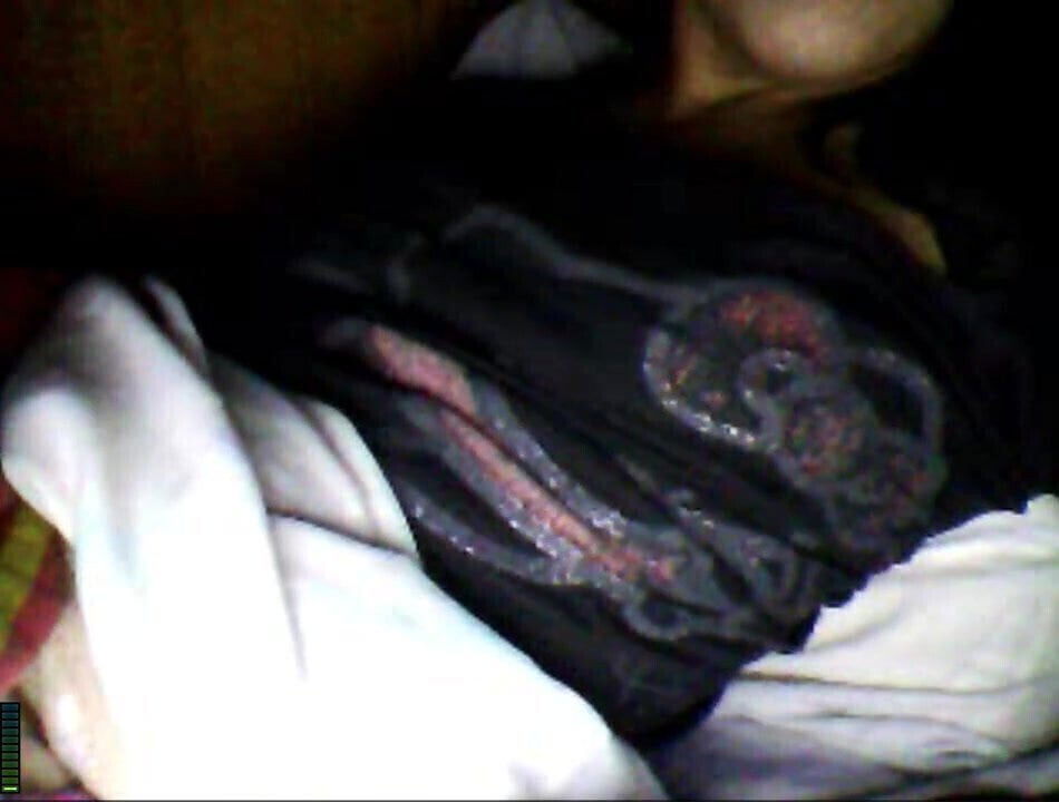 Argentinian masturbating while her roommate rests