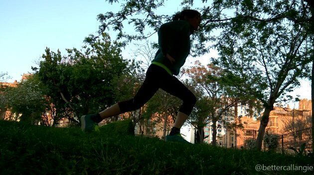 Doing lunges public park sunset, voyeur clip from grass