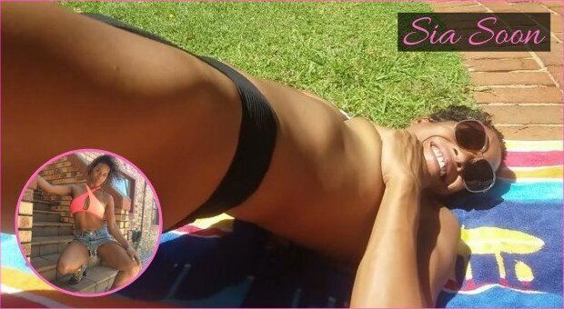 Ebony MILF topless bathing pool