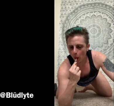 Goth trans sucking lollipop like your