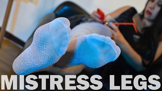 Mistress legs teasing white fishnets