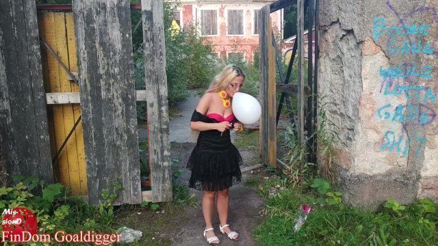 Blowing balloons near old manor in big eye glasses. Full Video in Fan Club.