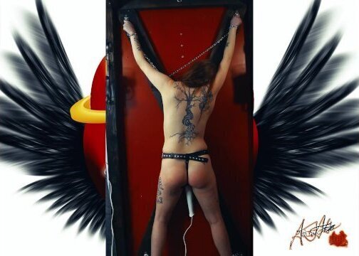 Little submissive Lilith Tortured on the St. Andrew's Cross. She squirms a LOT.