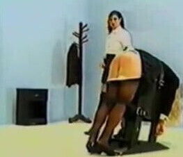 She gets spanked with Strap