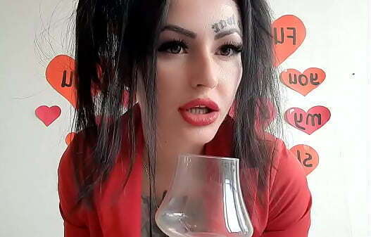 Happy Valentine'_s Day! Dominatrix Nika congratulates gives present.