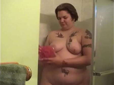 Tattooed chick strips wash cunt shower