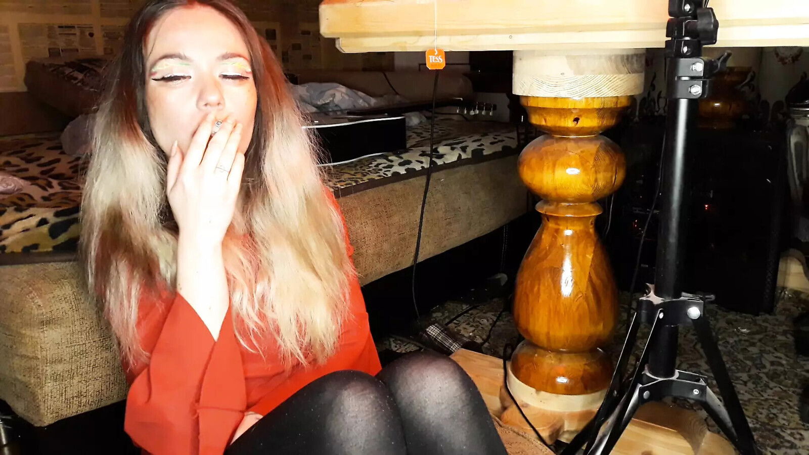 wife smokes cigarette