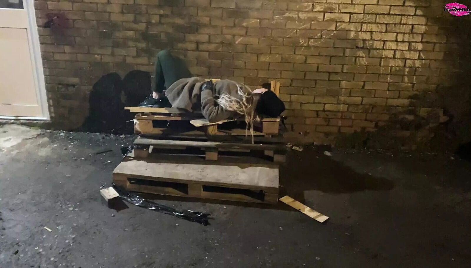 Homless woman poked face with