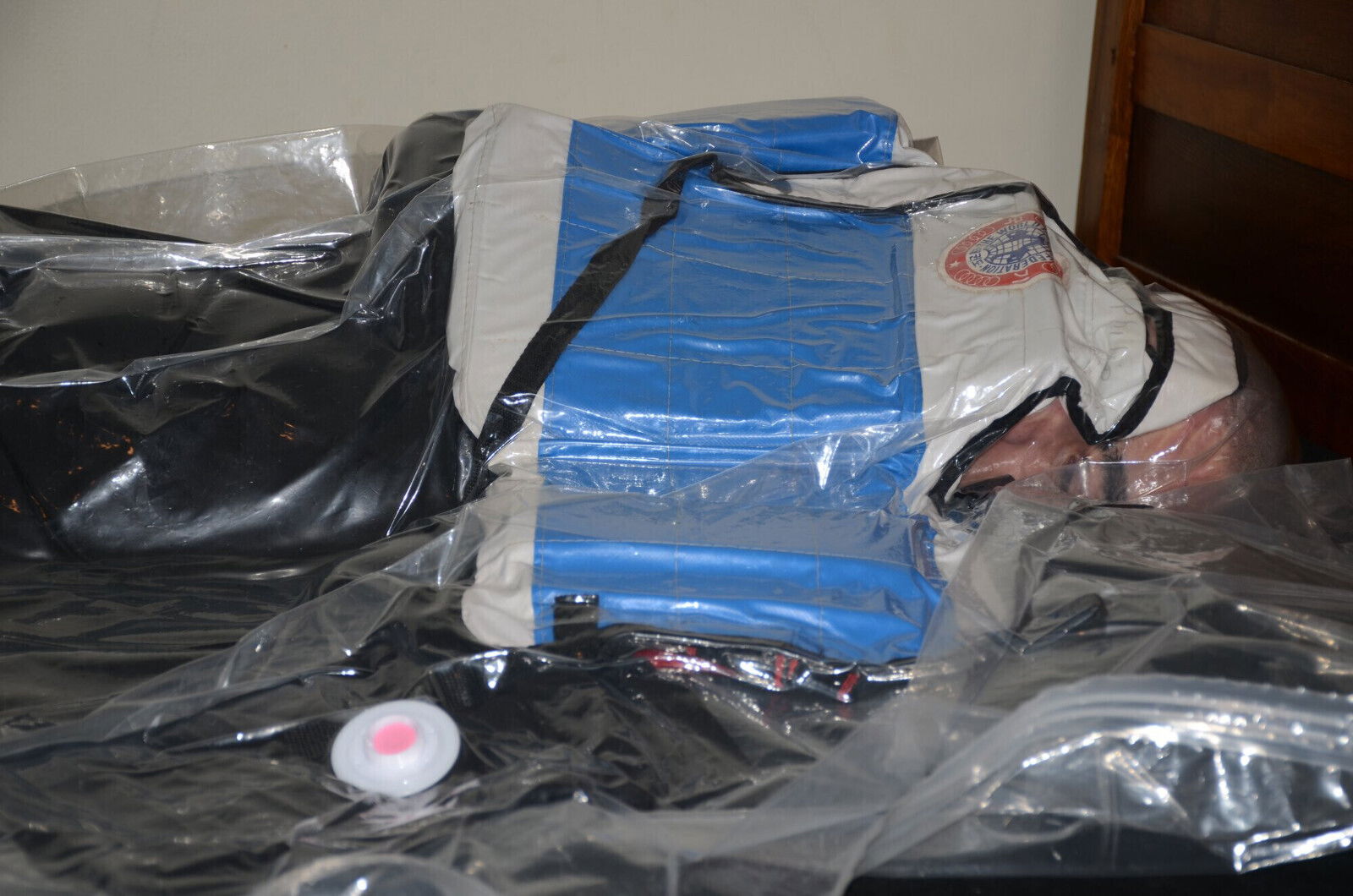 VacPacked under heavy neoprene sheeting with karate hockey baseball chesties