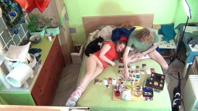 Eating cookies, playing board games with naked lower body. Hungarian funny dialogue.