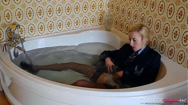 Drenched Doll Sophia Smith Keeps Uniform While Taking Bath!