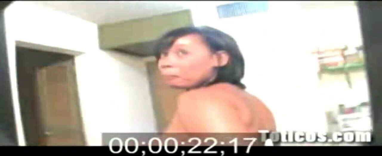 Dominican chick throats a black cock