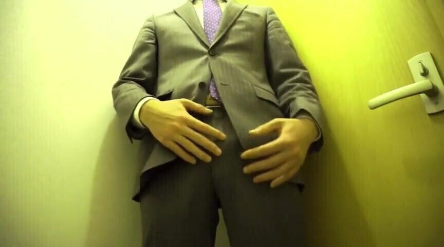 Standing jerk off in suit 
