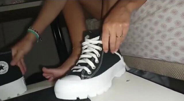 Trying my new converse on my slave