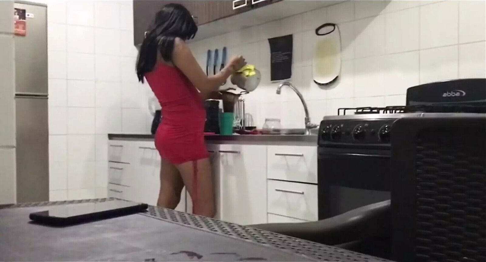 start recording girlfriend while makes coffee.