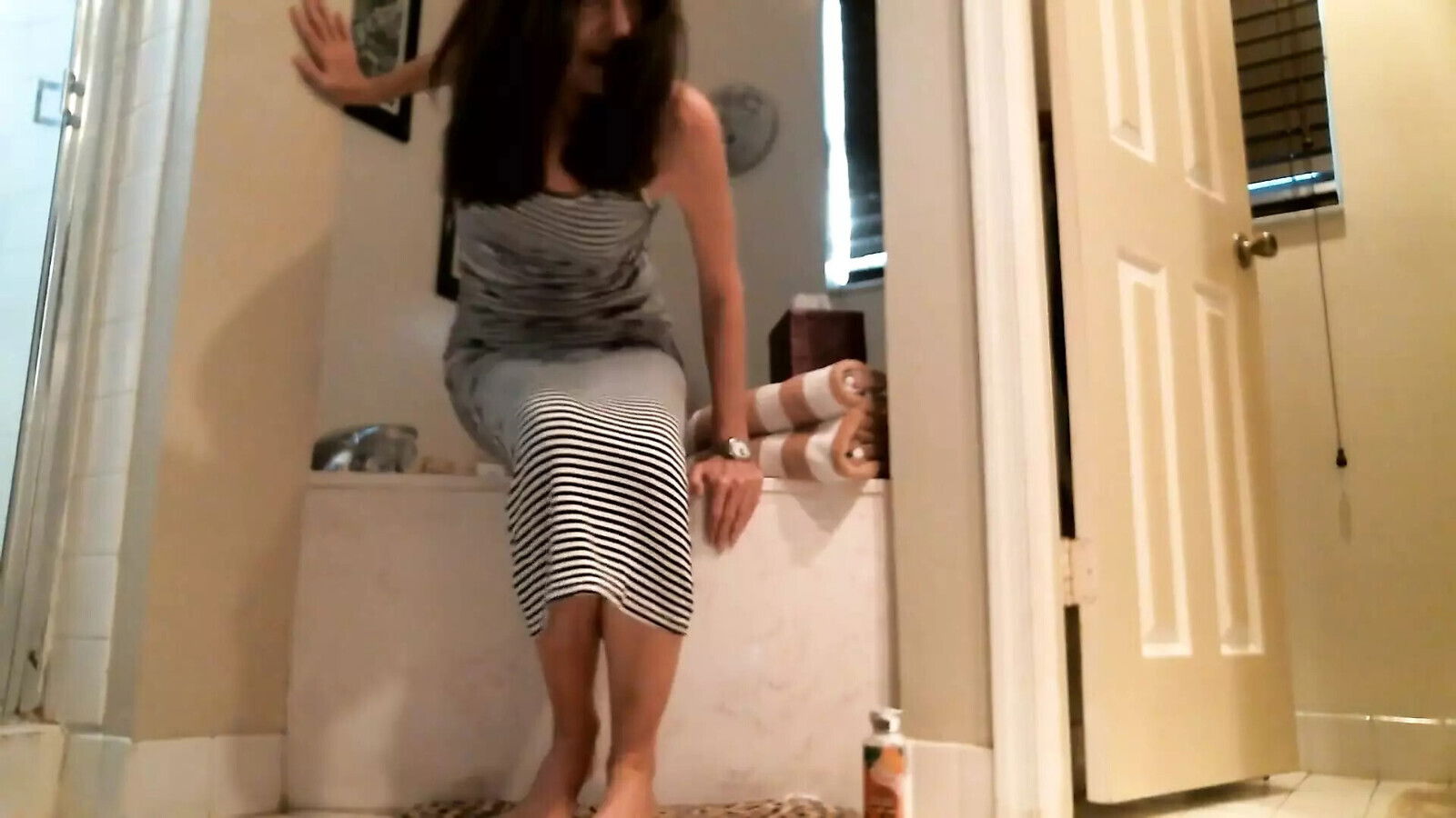 Rubbing lotion feet after shower