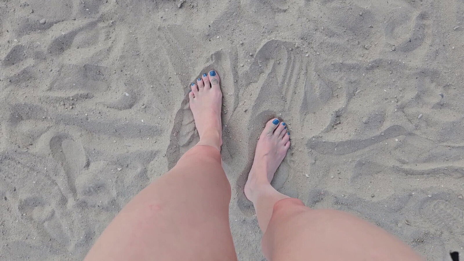 Playing With Feet Sand
