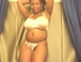 Huge Boobed Ebony in glasses shows off on cam