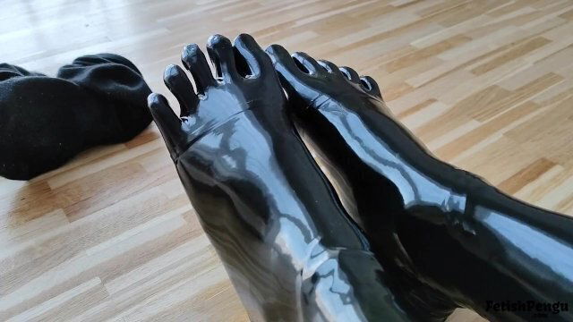 Putting latex socks shoes