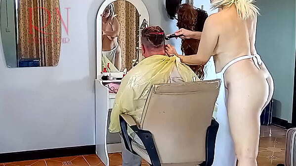 Nudist barbershop. Nude lady hairdresser apron. Security camera. client surprised.