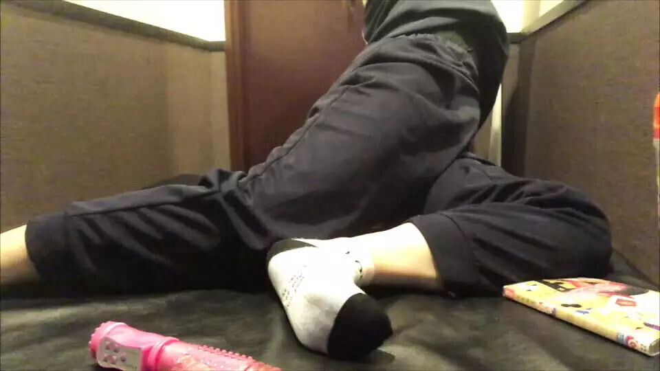 Cute girl masturbating with her legs spread in M-shape at an Internet cafe